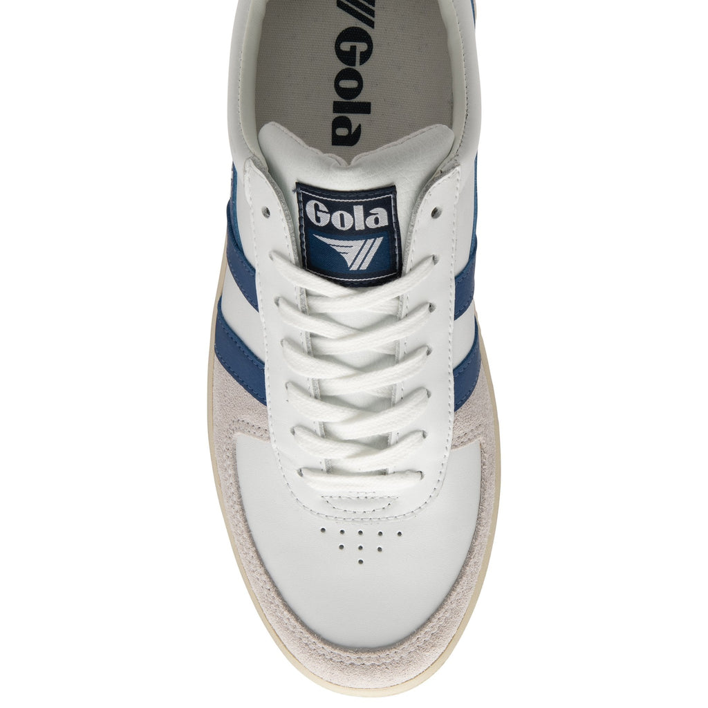 A white and blue Gola sneaker is shown from a top-down view.