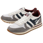 A pair of Gola Hurricane trainers in white with grey suede details and navy blue stripes.