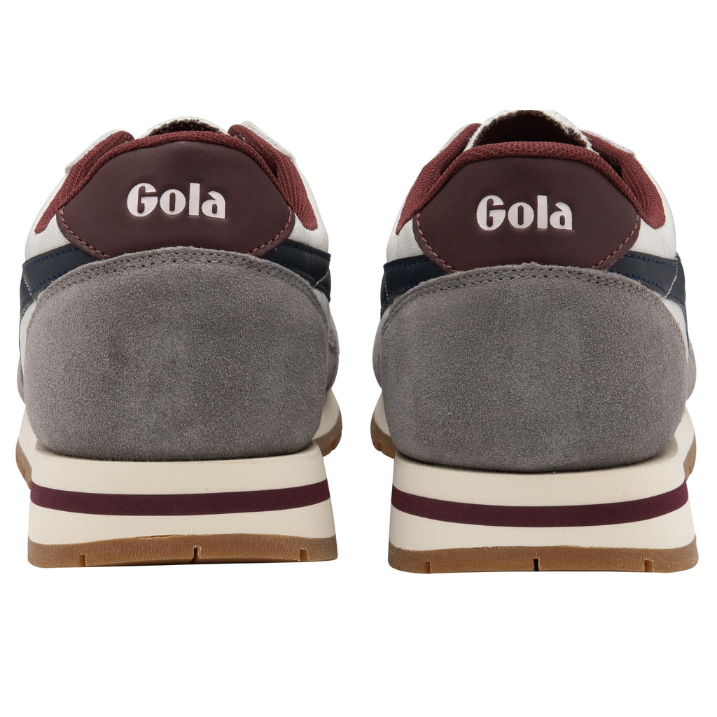 The rear view of a pair of Gola Hurricane trainers in white, grey, and navy.