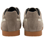 The back view of a pair of light brown Gola men's sneakers.