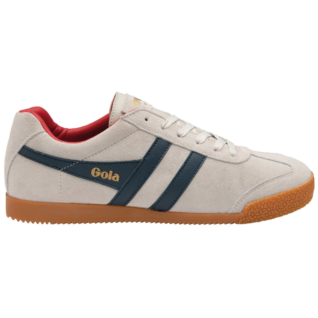 A single Gola Harrier trainer in off-white suede with navy stripes and a red lining.