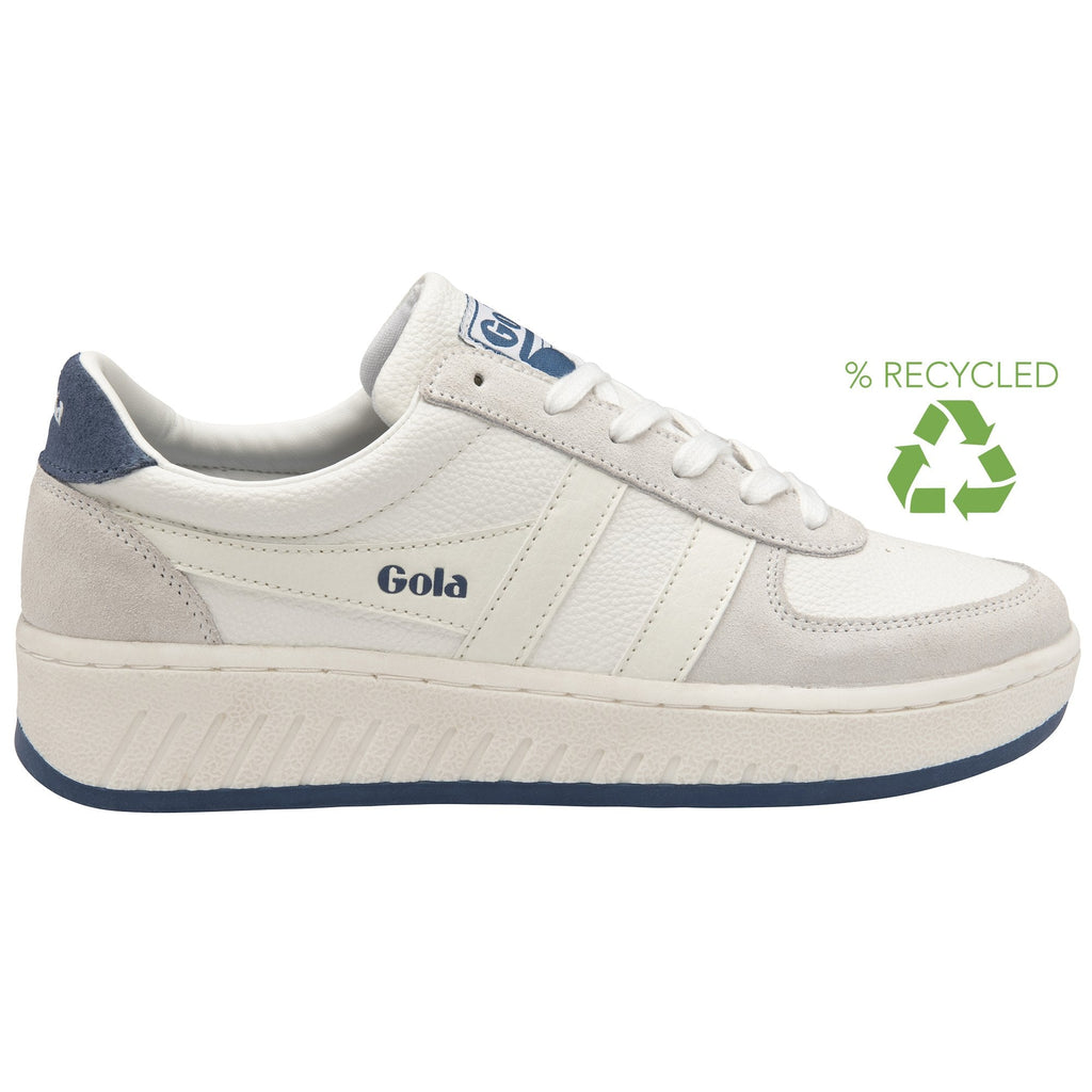 A recycled white trainer with blue trim from the side.