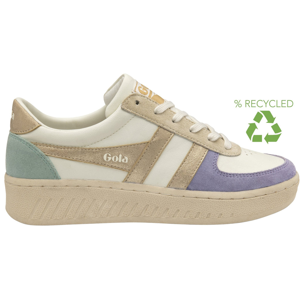 A white Gola sneaker with gold, mint green, and lilac purple accents, indicating recycled materials.