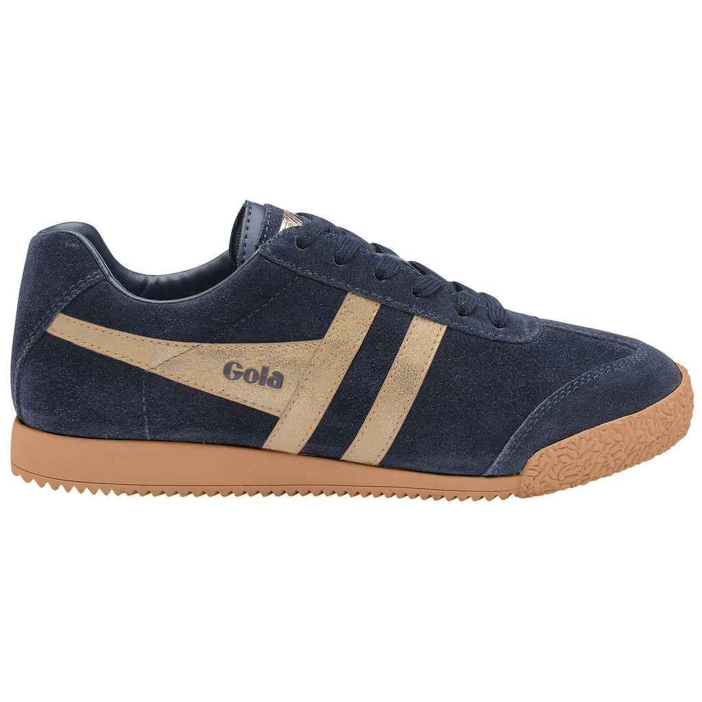 A single Gola Harrier trainer in navy with beige stripes on a white background.