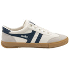 A white Gola sneaker with navy blue stripes and a light brown sole, viewed from the side.