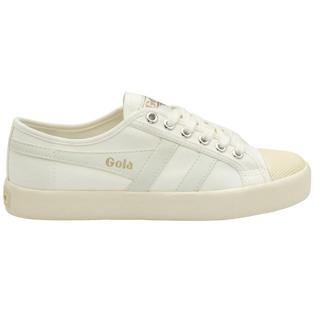 A single white canvas sneaker with gold Gola branding on the side.