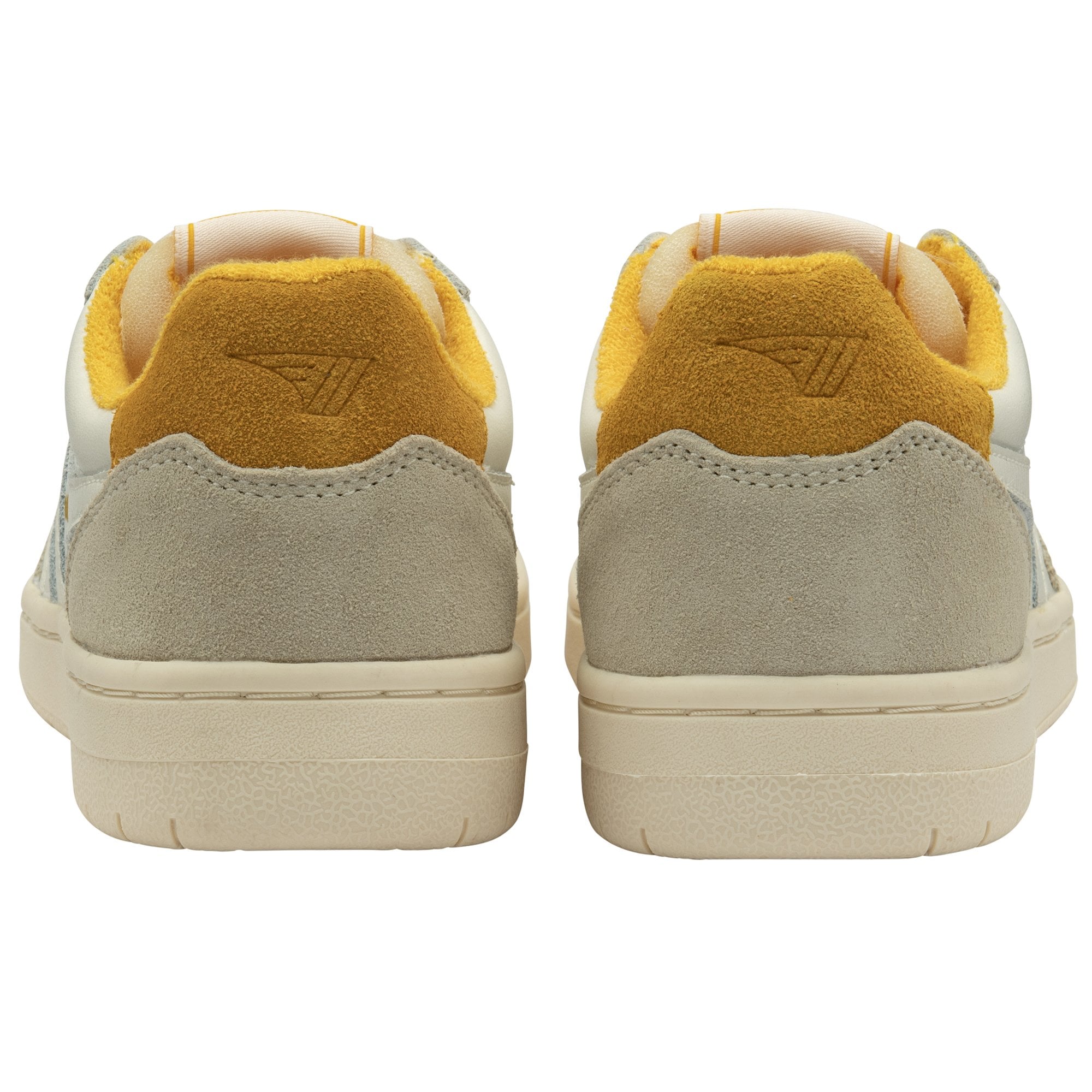 The back view of a pair of Gola low-top sneakers in white and yellow.