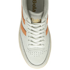 Top-down view of an off-white sneaker with orange stripes and white laces.