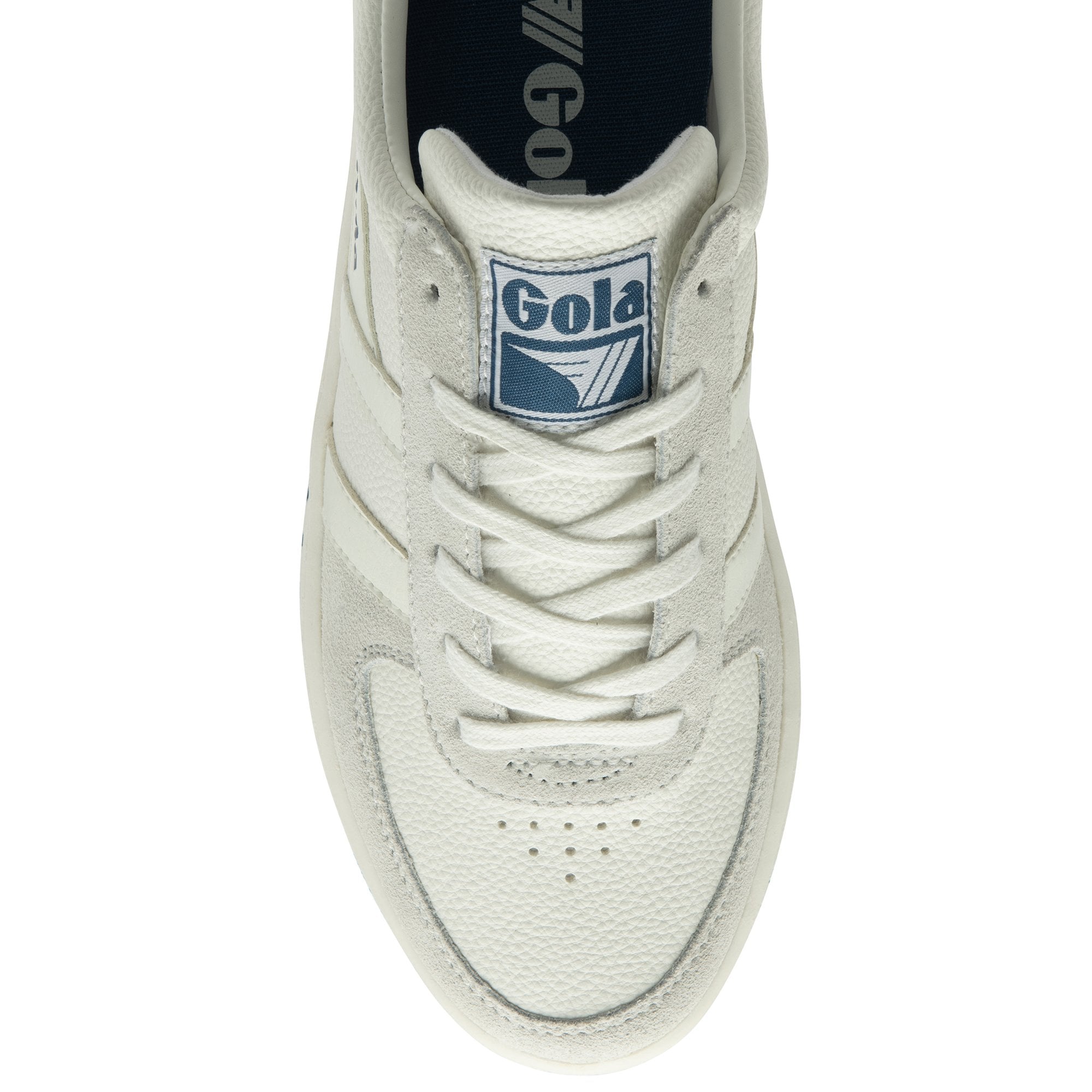The top-down view of a white trainer with blue trim.