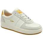 A single Gola sneaker, white with yellow accents, viewed from the side.
