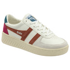 A single white Gola sneaker with brown stripes and pink and teal accents.