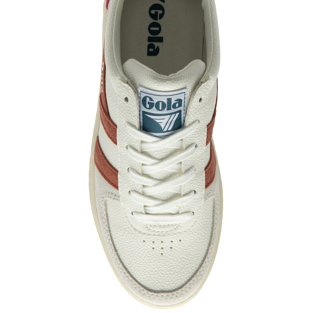 The top-down view of a white Gola sneaker with brown stripes and white laces.
