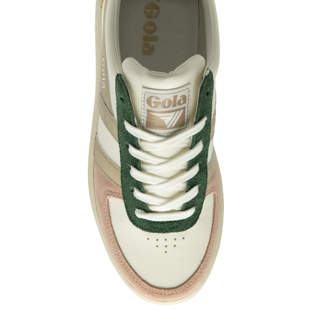 A top-down view of a single women's sneaker with white, pink, green, and gold accents.