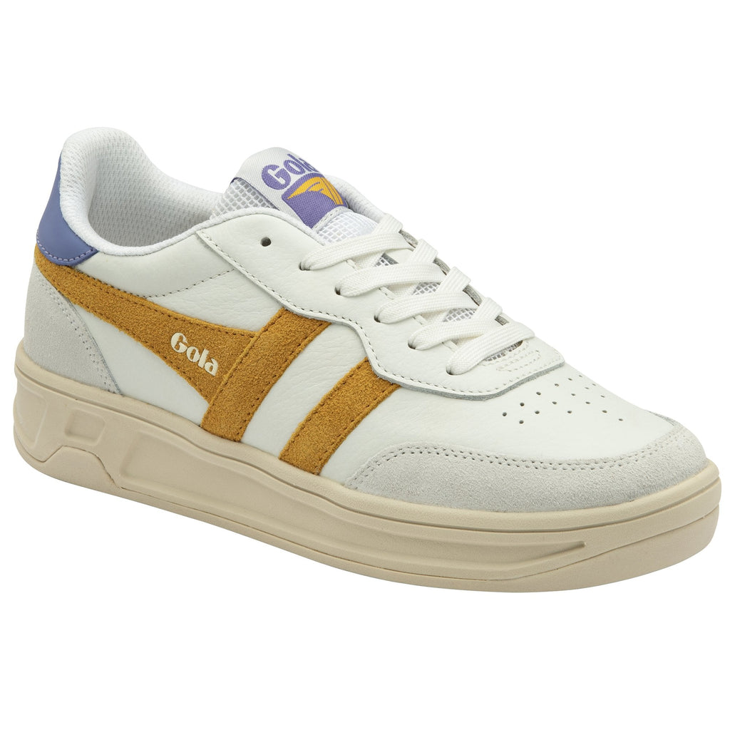 A single white sneaker with mustard yellow stripes and a purple heel accent, angled left.