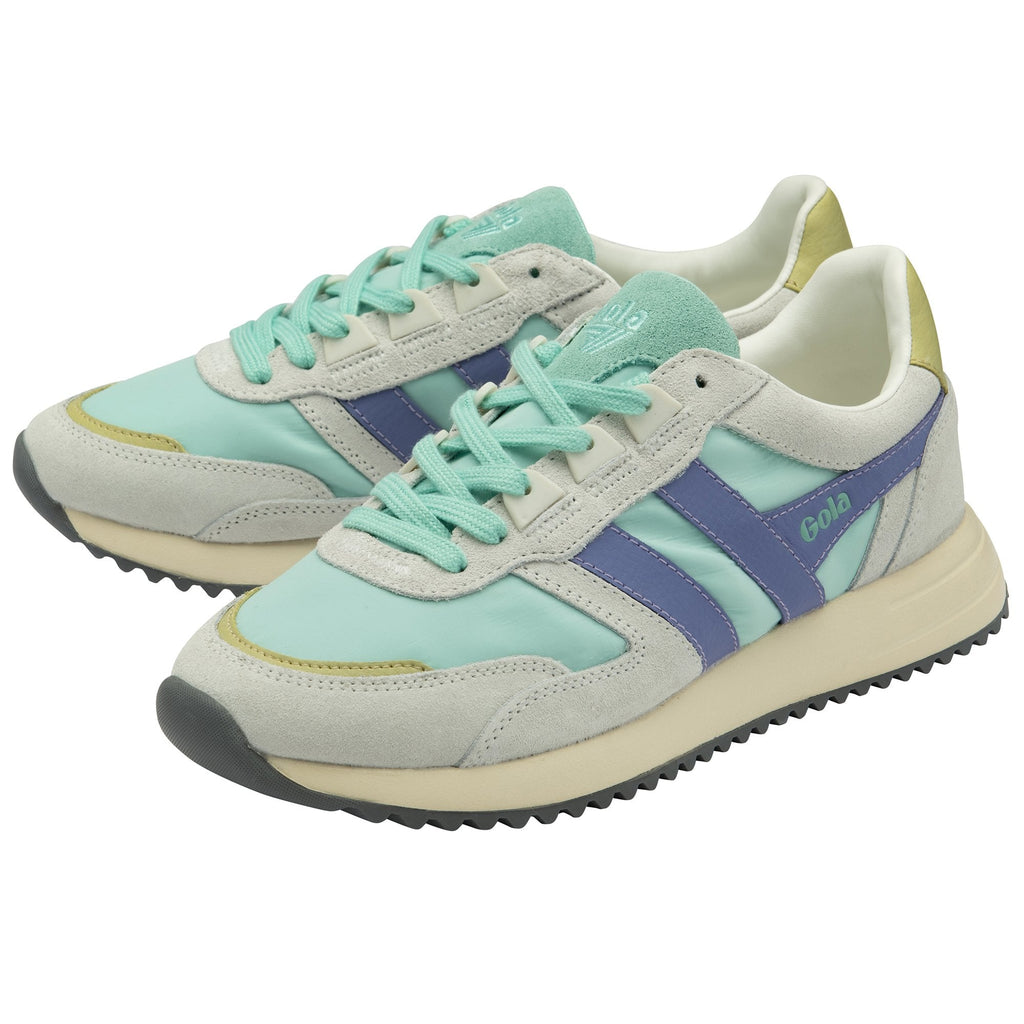 Pair of mint green and lavender Gola sneakers, angled to show both shoes.