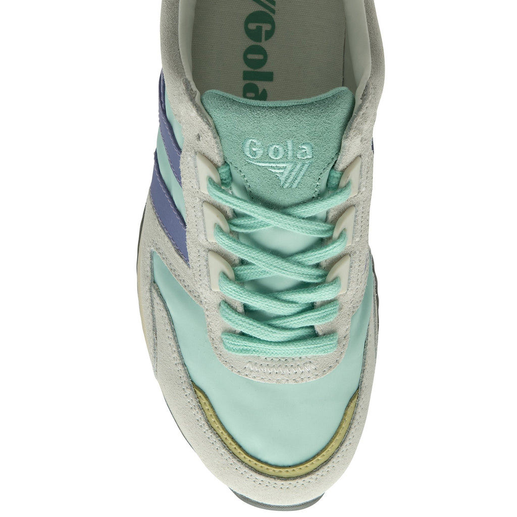 Top-down view of a mint green and lavender Gola sneaker, focusing on the laces.