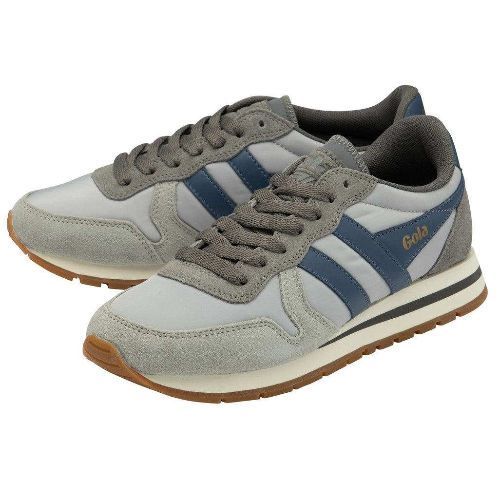 A pair of grey Gola sneakers with blue stripes.