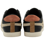 The rear view of two black Gola Bullet sneakers, showing brown heel accents.