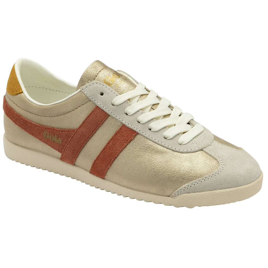 Angled view of a gold and red Gola sneaker with white laces.