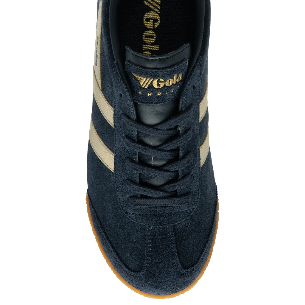 A top-down view of a single Gola Harrier trainer in navy and beige.