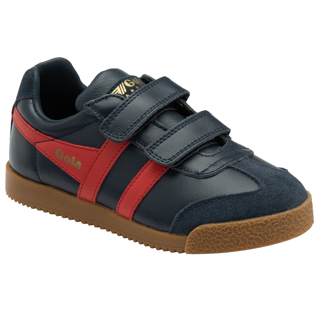 A pair of navy blue Gola trainers with red stripes and a gum sole.