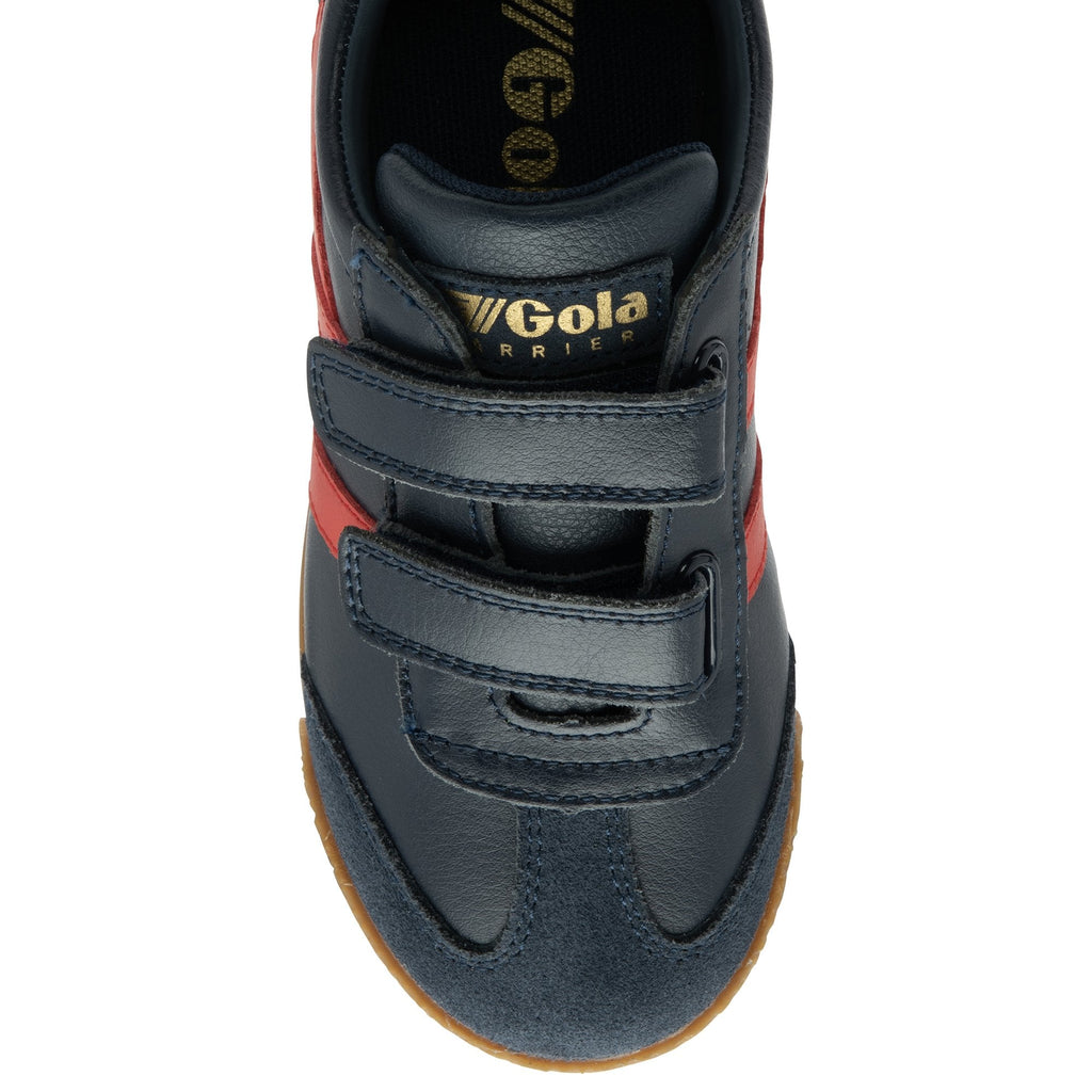 A top-down view of a navy blue Gola trainer with red stripes and a gum sole.