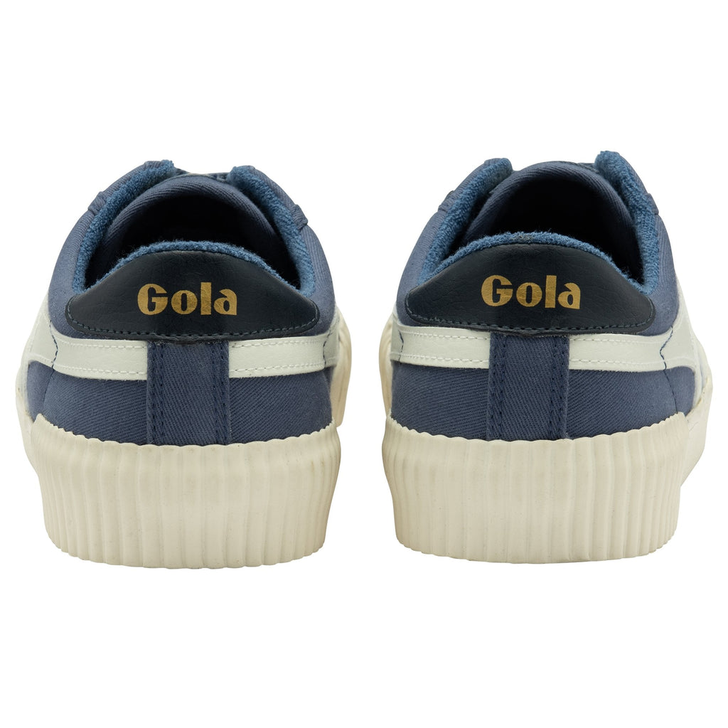 The backs of two blue canvas Gola men's sneakers with white stripes, on a white background.