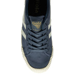 Overhead view of a blue canvas Gola men's sneaker with white stripes, on a white background.