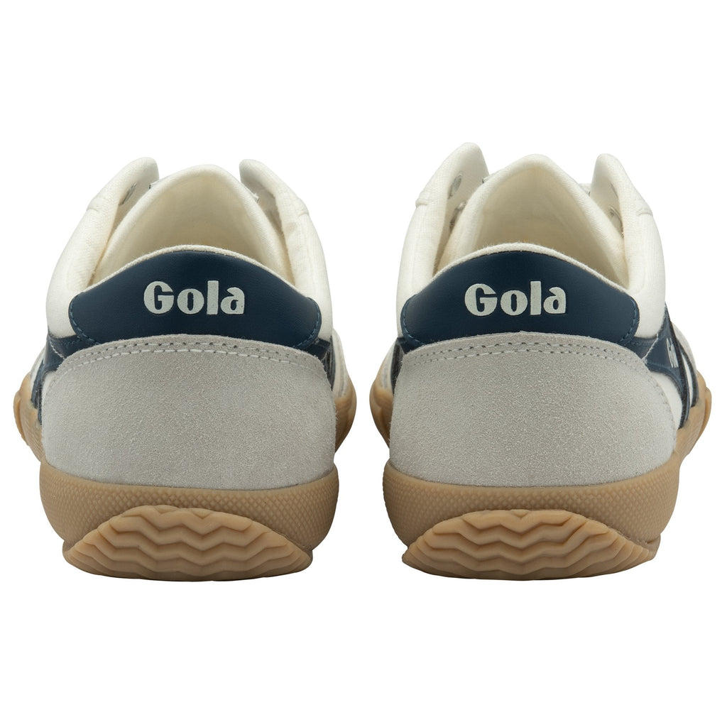 The back view of a pair of white Gola sneakers with navy blue heel tabs and gum soles.