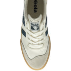 The top-down view of a white Gola sneaker with navy stripes, light grey suede, and a gum sole.
