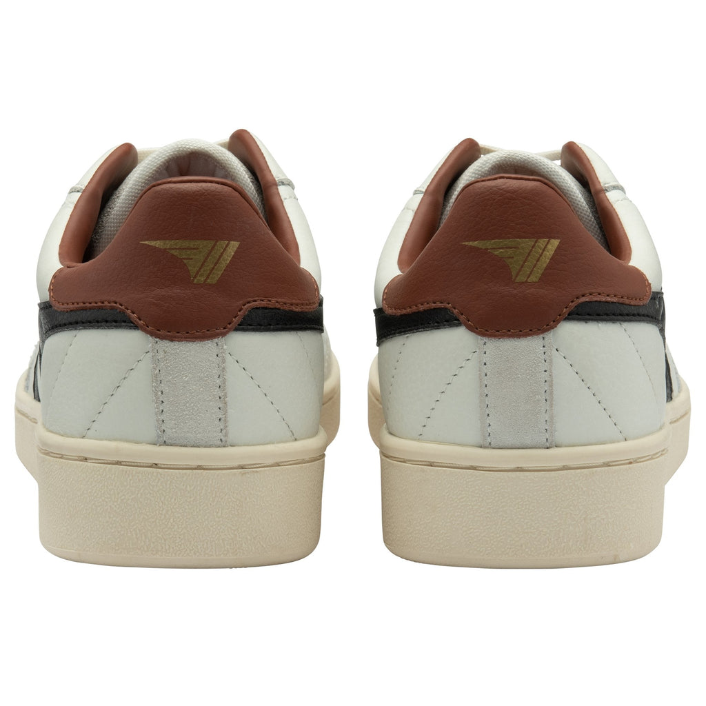 Rear view of white Gola tennis shoes with brown and black accents.