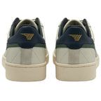 The back of a pair of white and green Gola sneakers.