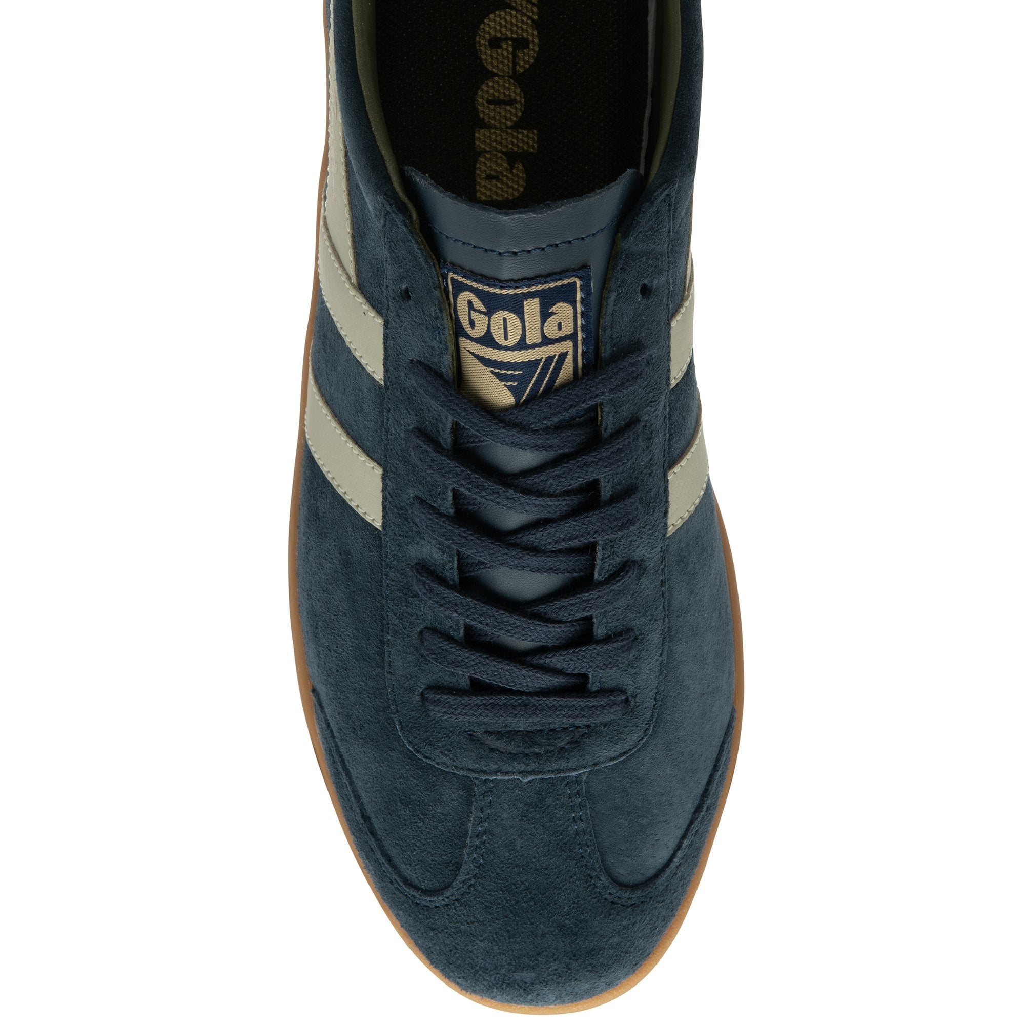 Top down view of a navy suede Gola sneaker with a gum sole and tan accents.
