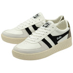 A pair of white Gola sneakers with black stripes.