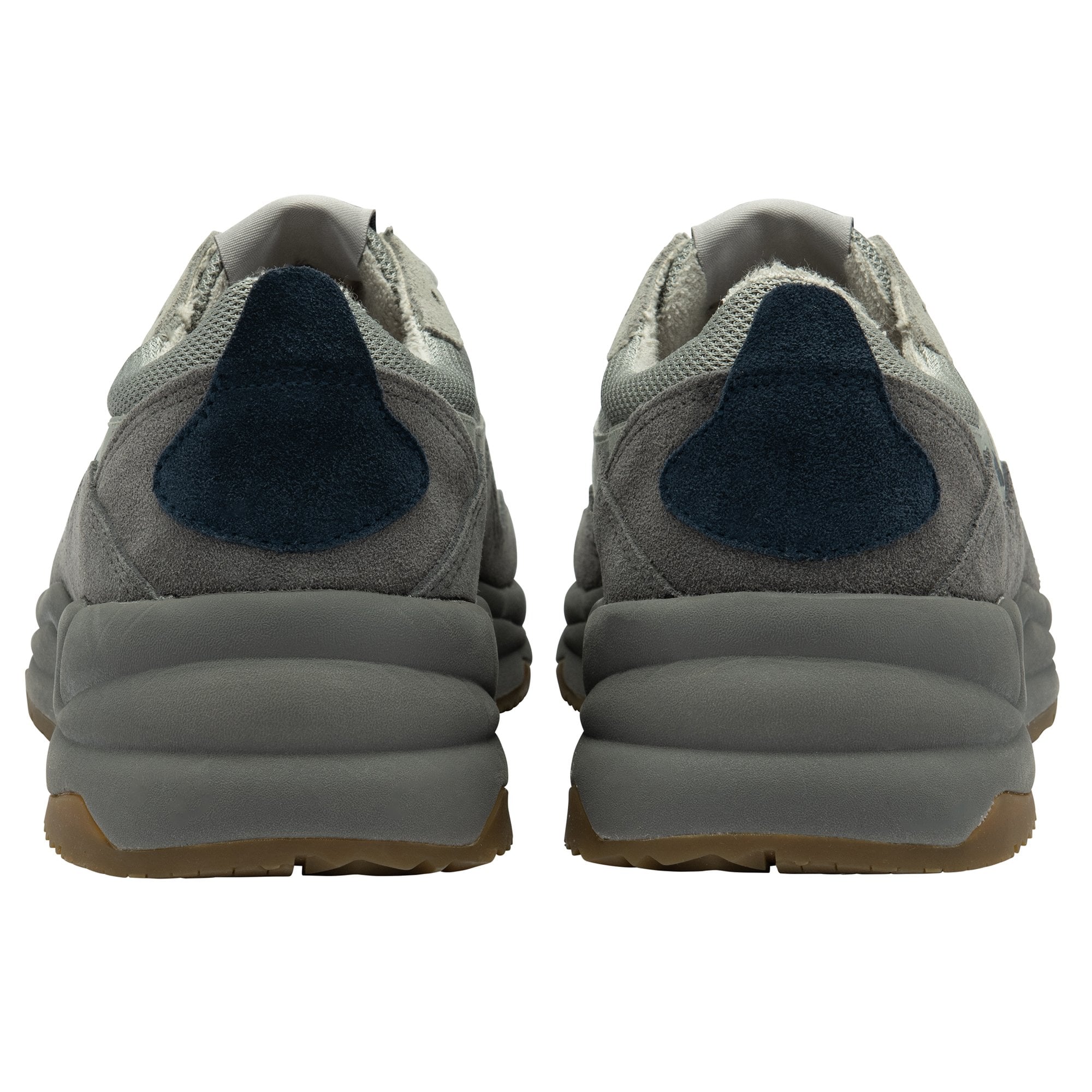 The back view of two light grey and dark grey Gola sneakers with blue accents.