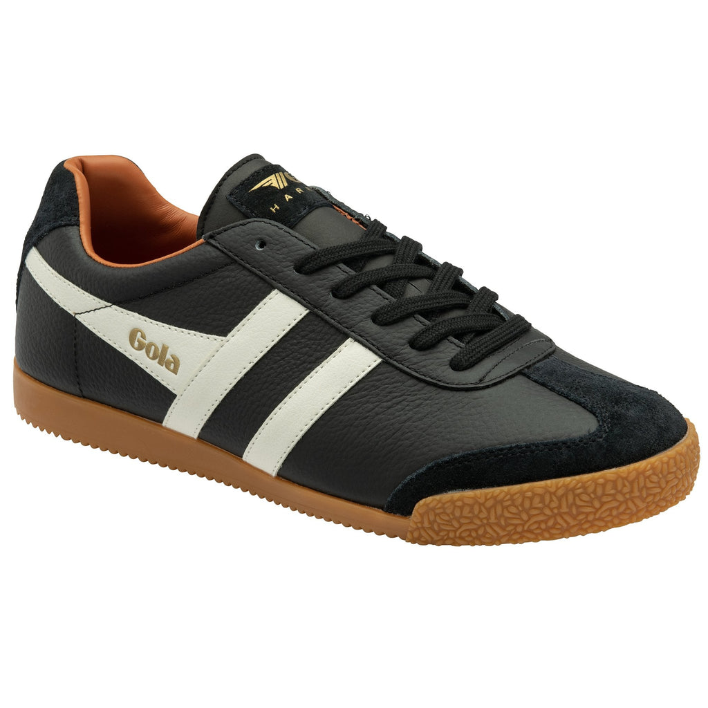 A right black Gola men's shoe with white stripes and a tan sole, angled to the right.