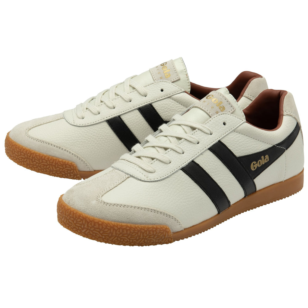 Pair of Gola men's sneakers in off-white with black stripes and gum soles.