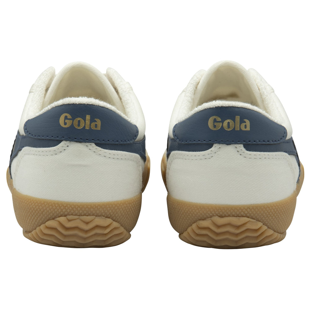 The backs of two white Gola sneakers with navy accents and gum soles.