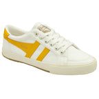 A white Gola sneaker with two yellow stripes, side view.