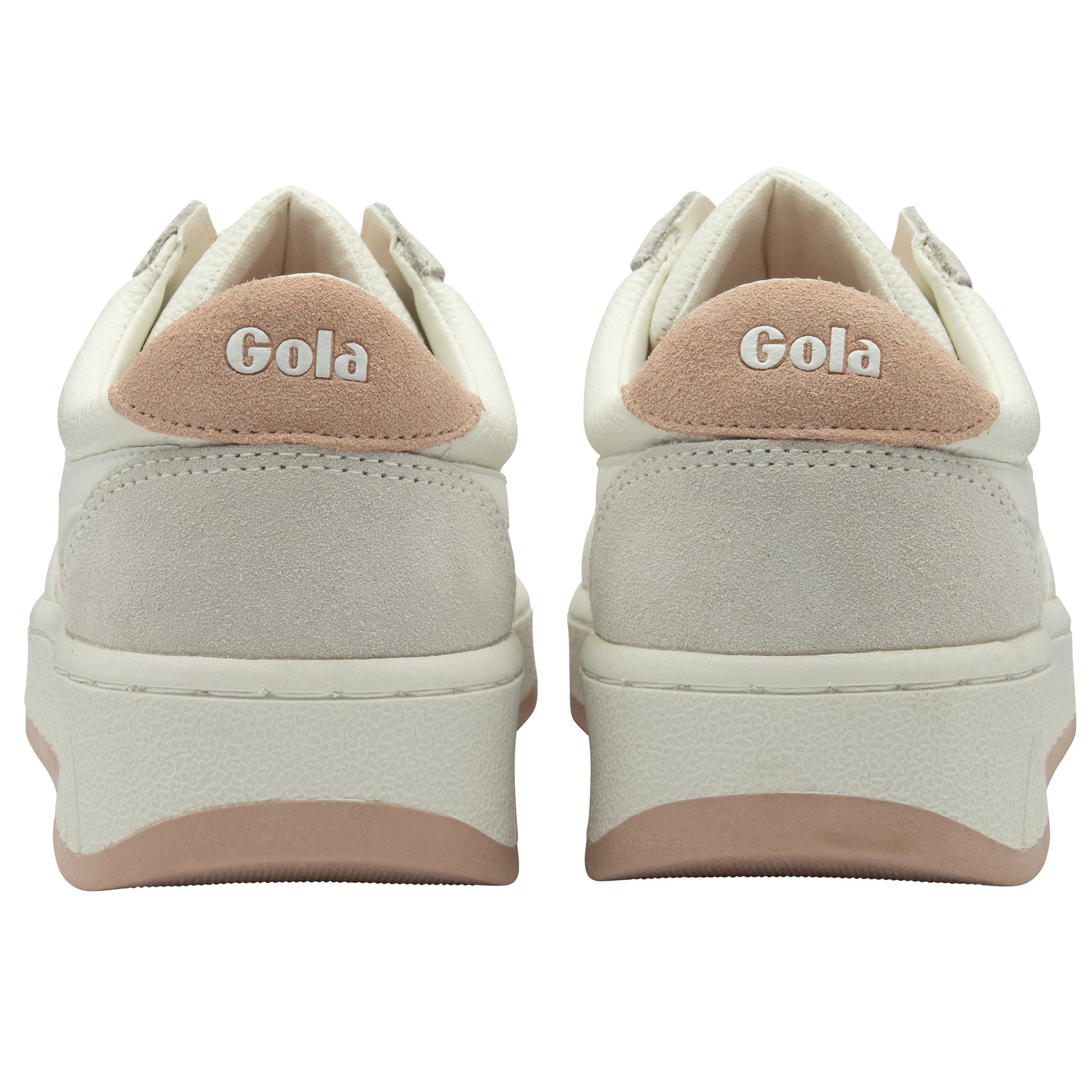 The back view of two white Gola sneakers with blush pink heels and soles.