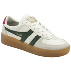 Angled view of a white Gola sneaker with green stripes and a gum sole.