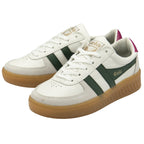 Pair of white Gola sneakers with green stripes, gum soles, and magenta heel tabs.