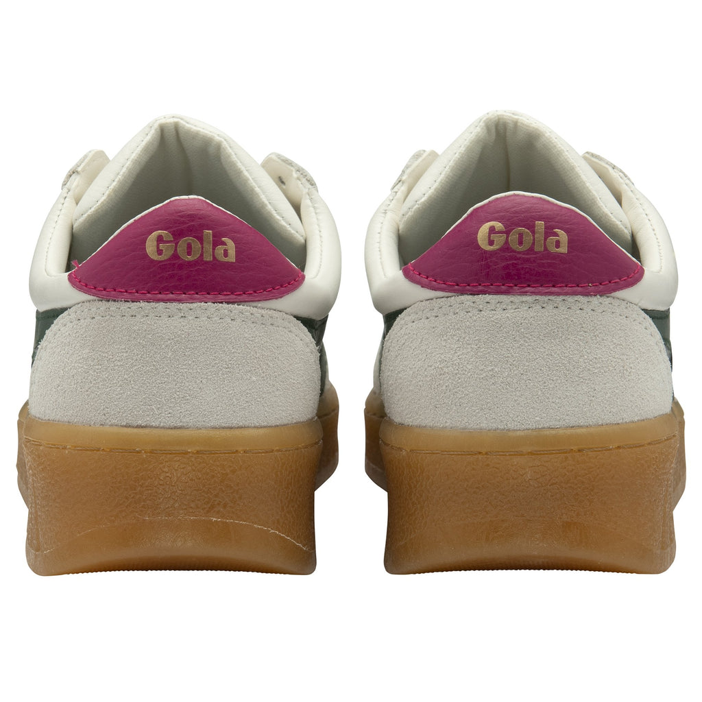 Rear view of two white Gola sneakers showing magenta heel tabs with logo.