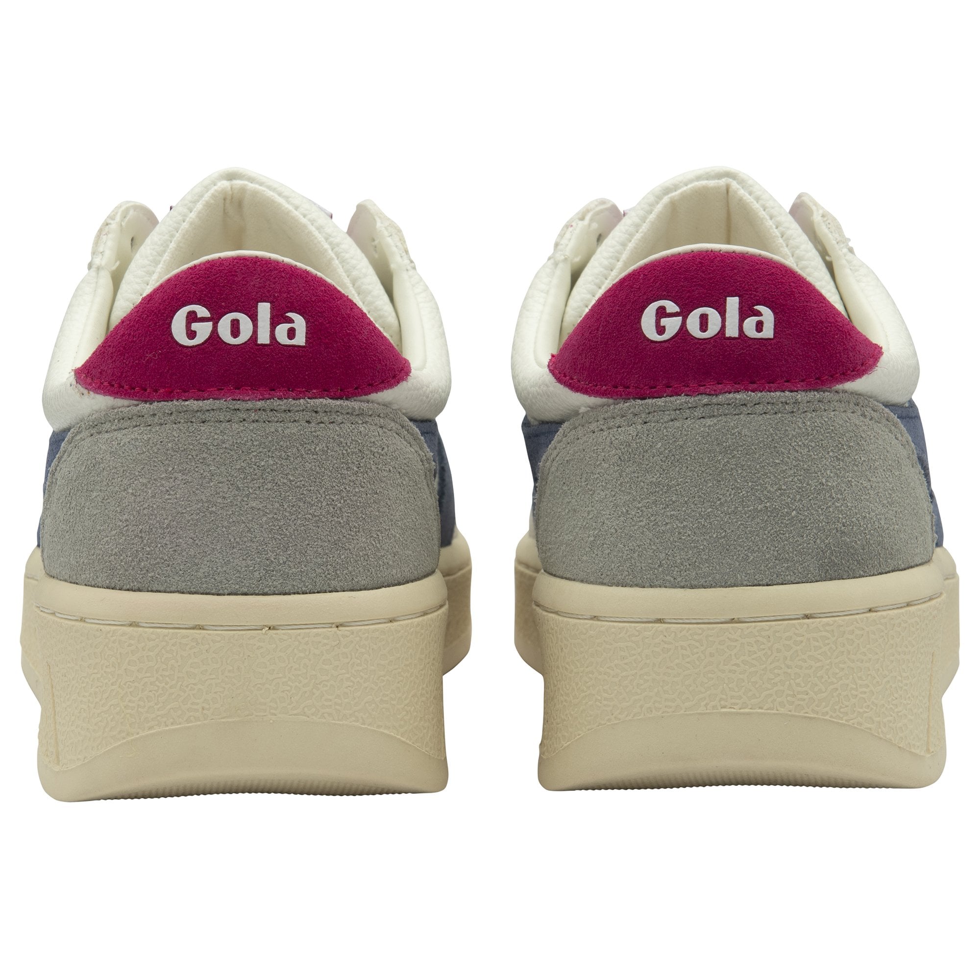 The backs of two Gola sneakers with pink accents and the brand name.