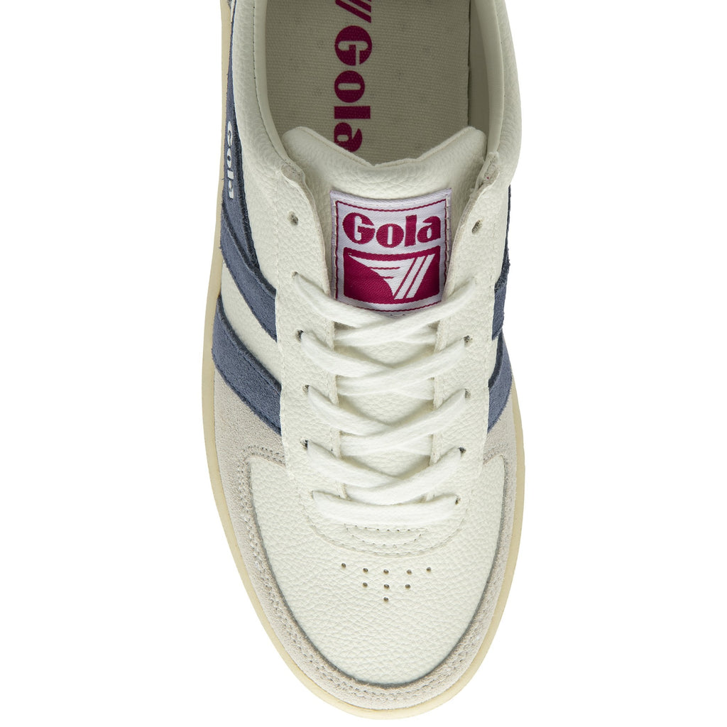 The top view of a Gola sneaker with white laces and a pink brand logo.