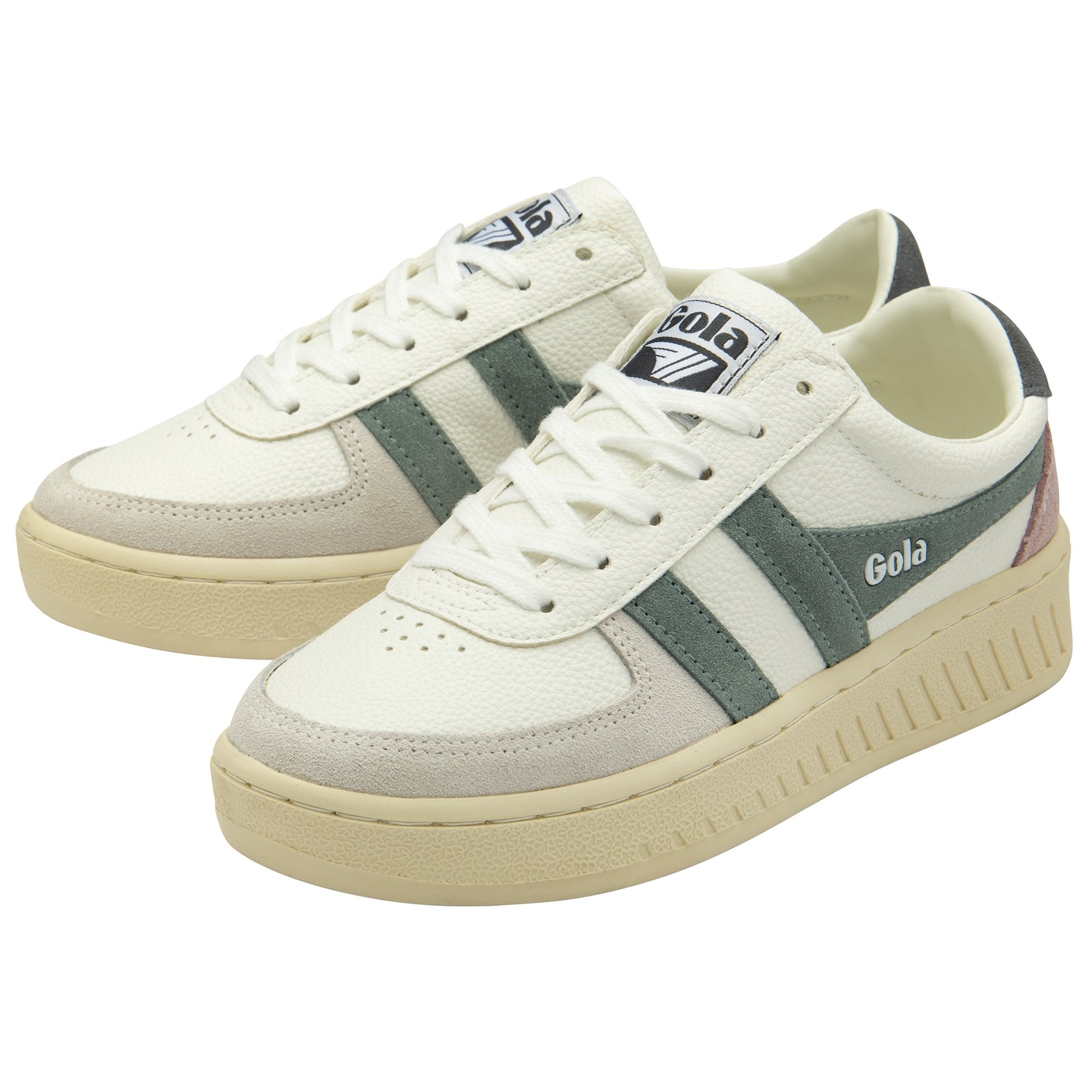A pair of cream Gola sneakers with green stripes, grey, and pink accents.