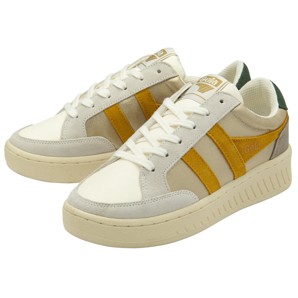 A pair of Gola women's low top sneakers. White, cream, mustard yellow, and green colors.