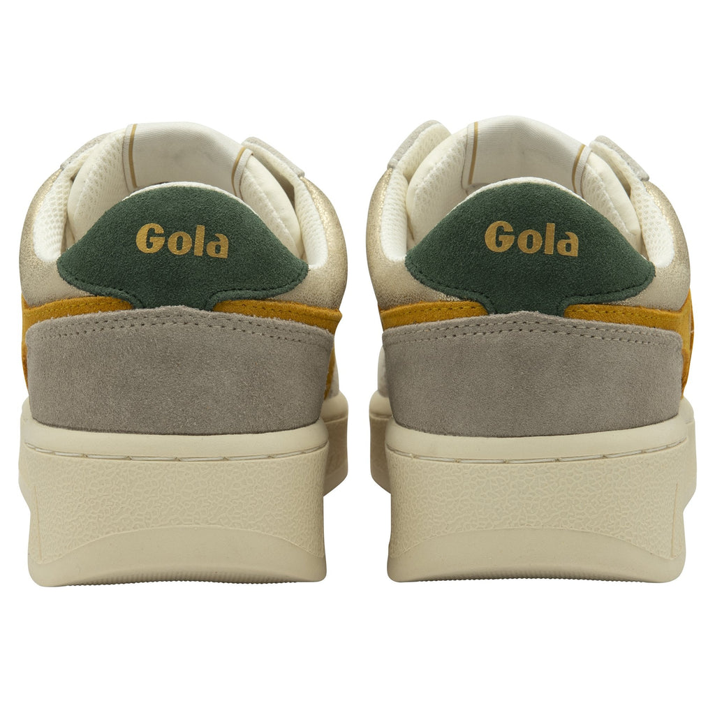 Back view of Gola women's low top sneakers. Green heel tabs with "Gola" in yellow.