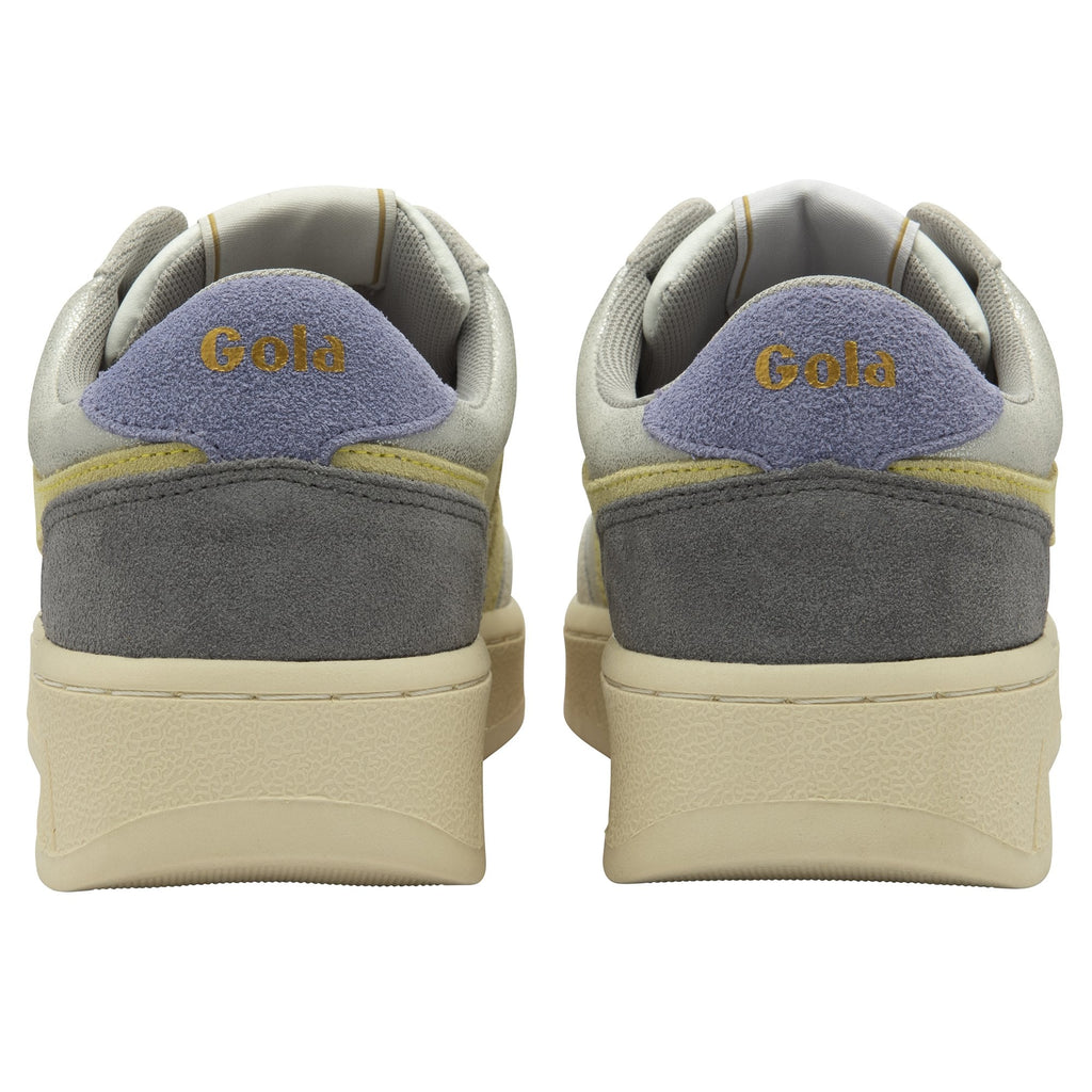 The heels of two Gola sneakers, featuring blue, gray, and gold accents.