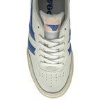 Top-down view of a white Gola sneaker with blue stripes and white laces.